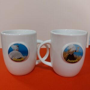 Grote koffiemok boerin en Zeeuws meisje